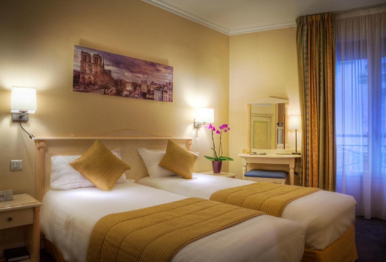 Hotel Louvre Sainte Anne Париж Стая снимка