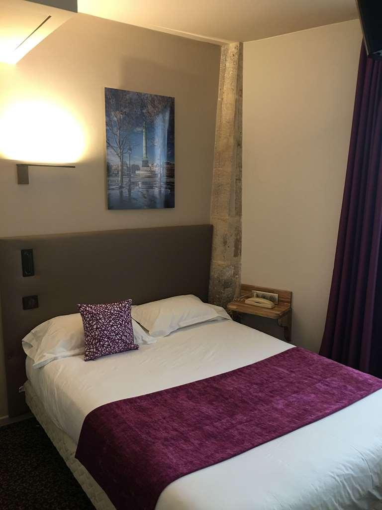 Hotel Louvre Sainte Anne Париж Стая снимка