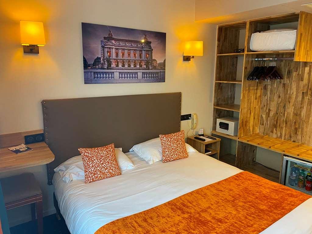 Hotel Louvre Sainte Anne Париж Стая снимка