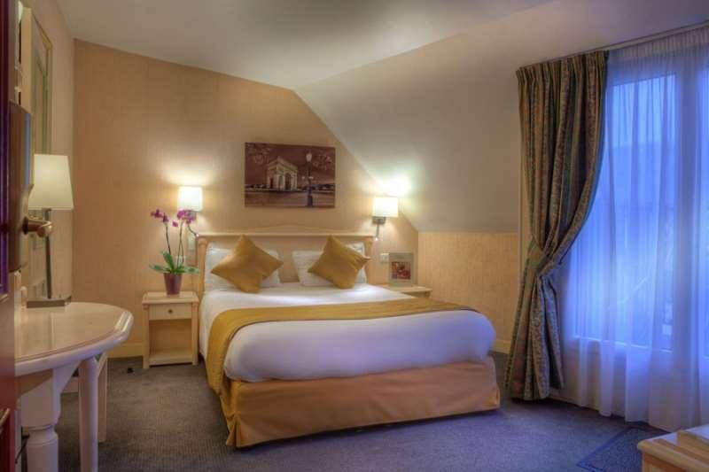 Hotel Louvre Sainte Anne Париж Стая снимка