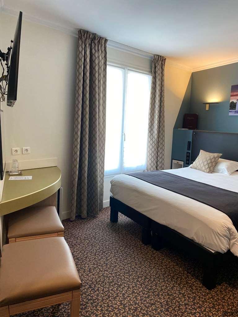 Hotel Louvre Sainte Anne Париж Стая снимка