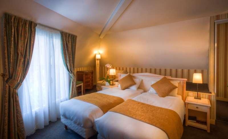 Hotel Louvre Sainte Anne Париж Стая снимка